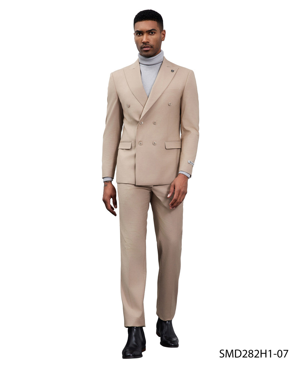 Double-breasted peak lapel suit in tan