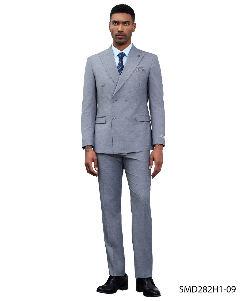 Double-breasted peak lapel suit in grey