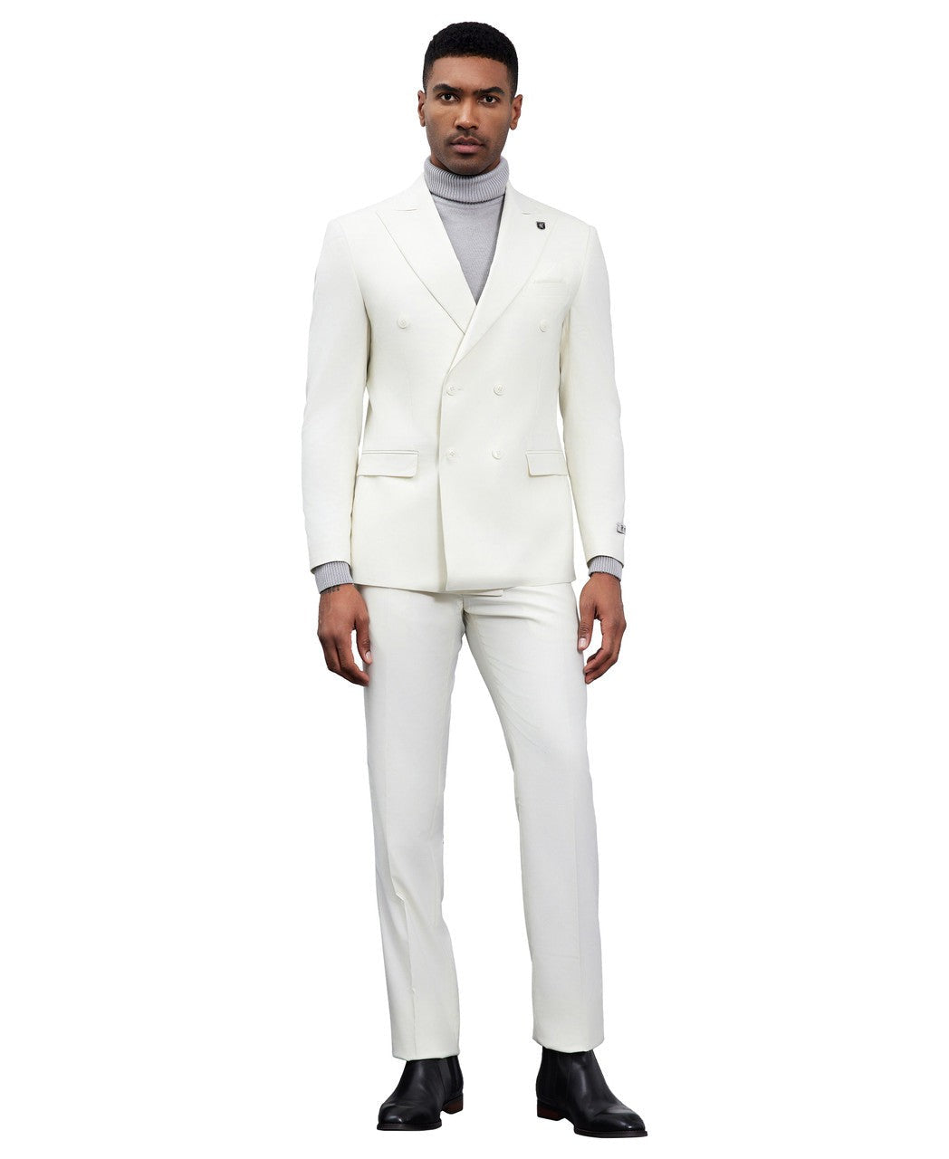 Double-breasted peak lapel suit in ivory