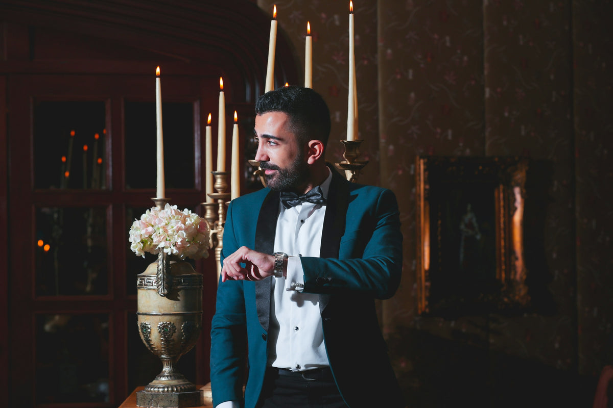 Man in a teal velvet tuxedo jacket
